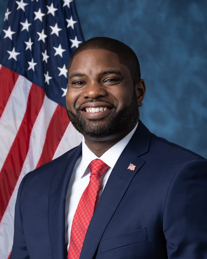 Byron Donalds’ 2021 official congressional portrait with an editorial campaign-finance sticker